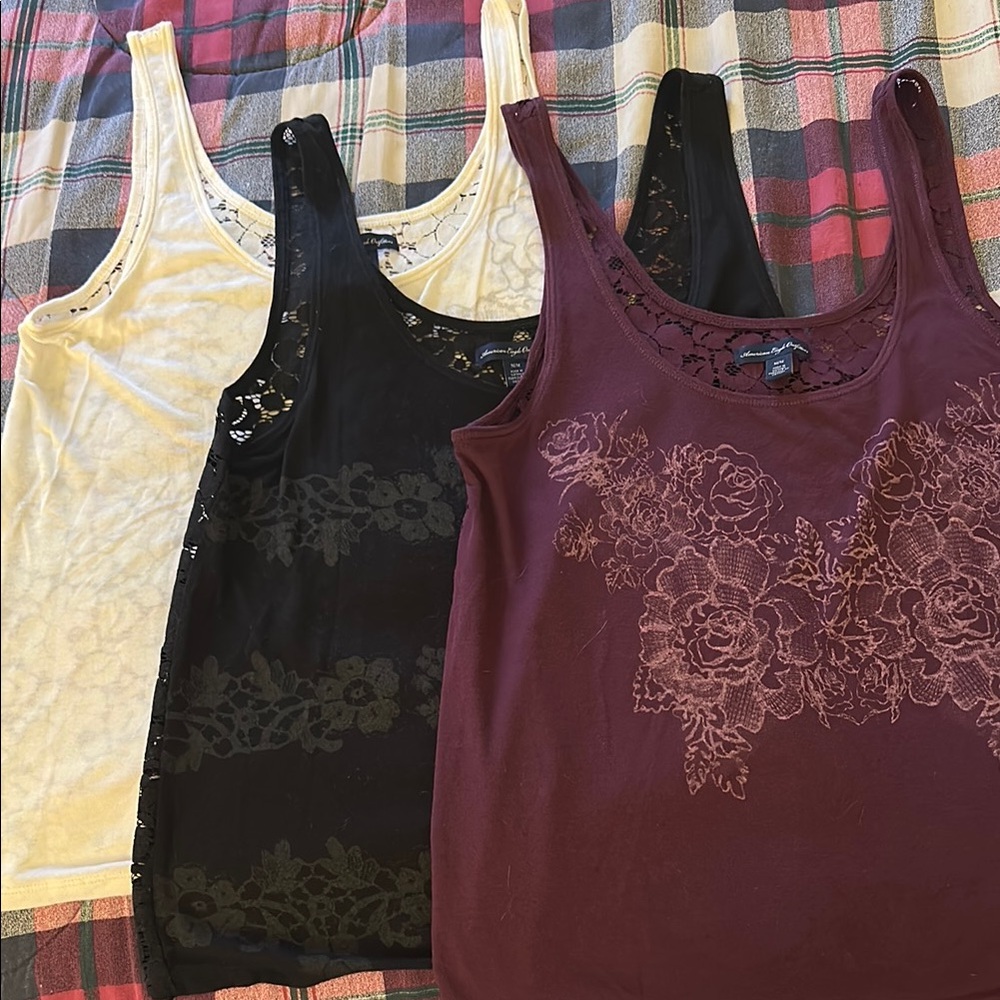 Three tank tops